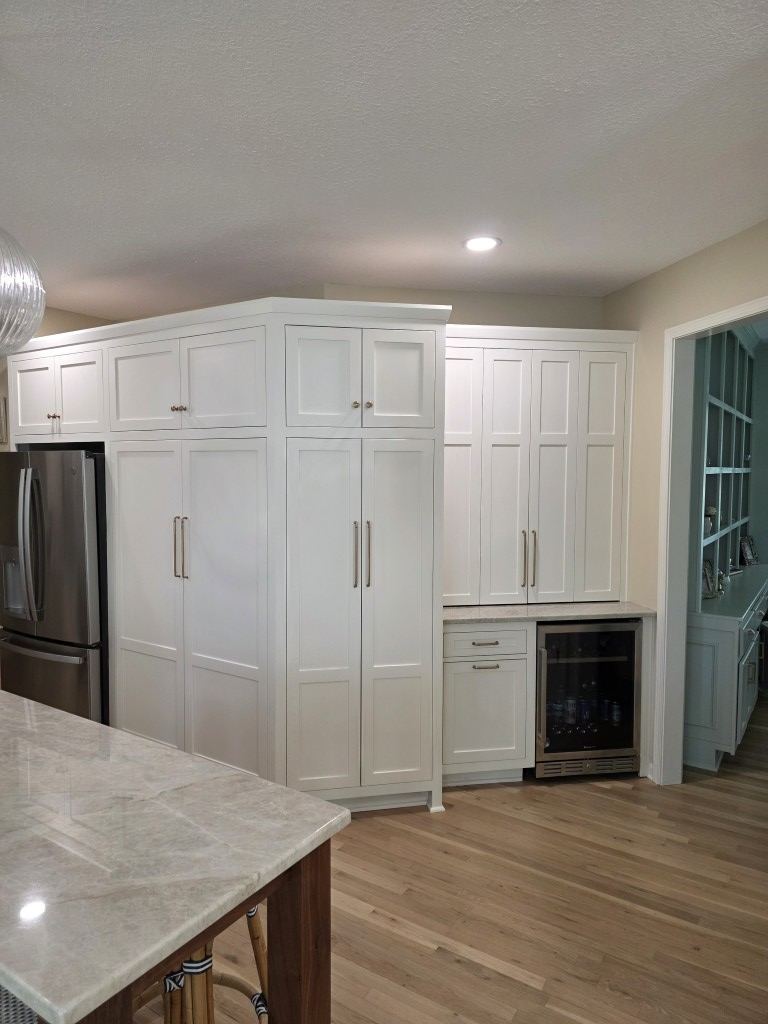 White & Walnut Kitchen cabinetry detail in Olathe, KS